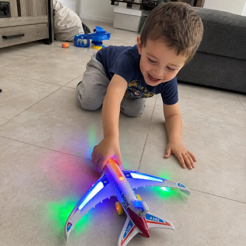 Bump & Go Instantly! No-Stop Light-Up Musical Airplane